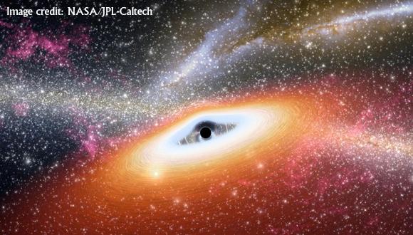 Artist's impression of a gas disk feeding a massive black hole, while emitting radiation